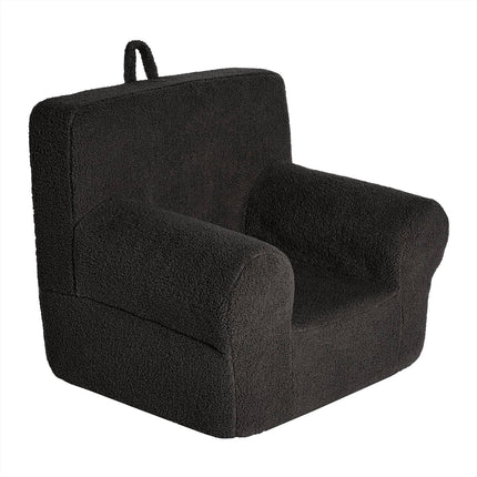 Discover the My Cloud Kidz Chair, a cozy black armchair for children. Wrapped in soft Sherpa fabric, it features a handle on top, wide armrests, and a high backrest. A perfect addition to your customizable furniture collection!.