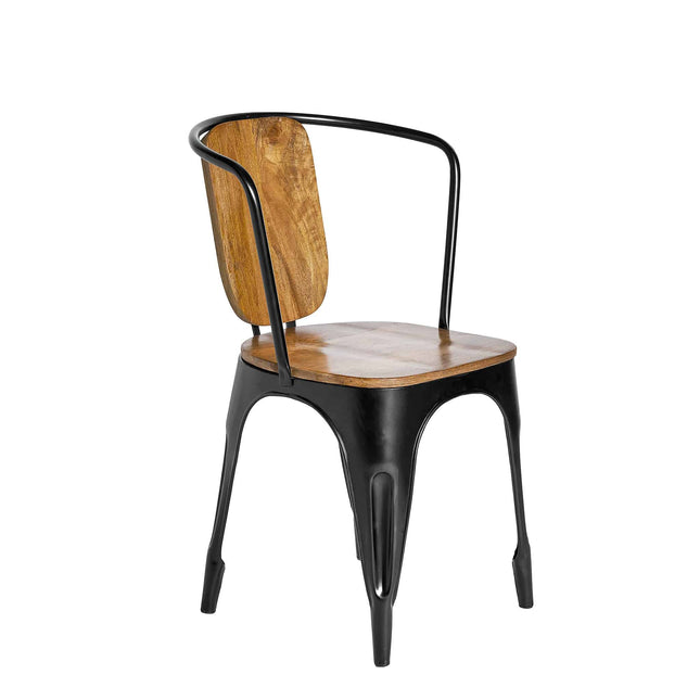 The Mango Barrel Chair features a curved metal frame with a seat and backrest crafted from sustainable handcrafted mango wood. Its light brown hues contrast with black metal legs, offering an enchanting blend of industrial and rustic design.