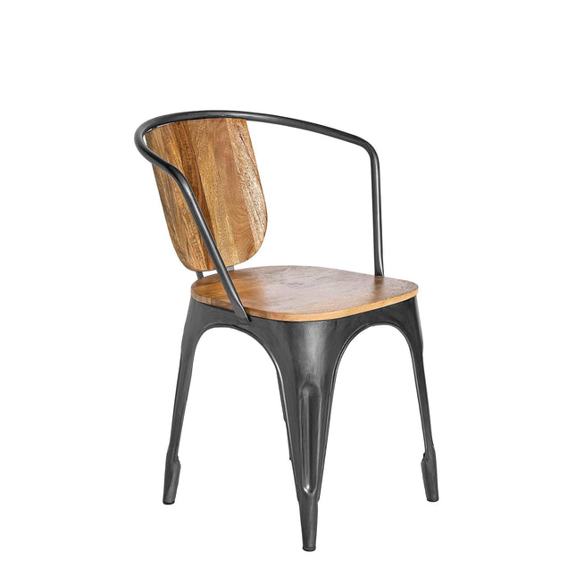 The Mango Barrel Chair features a wooden seat and backrest made from sustainable mango wood, complemented by a sleek black metal frame. Its design blends industrial and rustic elements with curved legs and an arched back support, all set against a white background.
