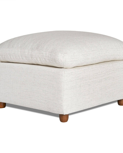 The My Cloud Slope 30 Ottoman in cream features a cushioned top and four rounded wooden legs, blending style and comfort as a prime example of customizable furniture.