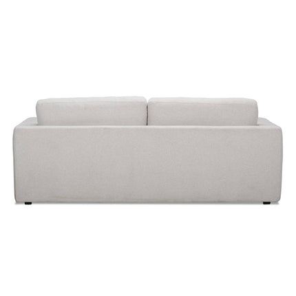 The light gray Lugano Sofa embodies Italian luxury with its minimalist design, featuring two rectangular back cushions and a solid, streamlined structure. Crafted from premium materials, it boasts clean lines and rests on discreet feet.