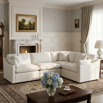 My Cloud modular sectional in a light neutral staged in an elegant traditional living room with fireplace