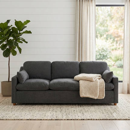 My Cloud Slope Sofa in Classic Gray staged in a bright scandinavian family room