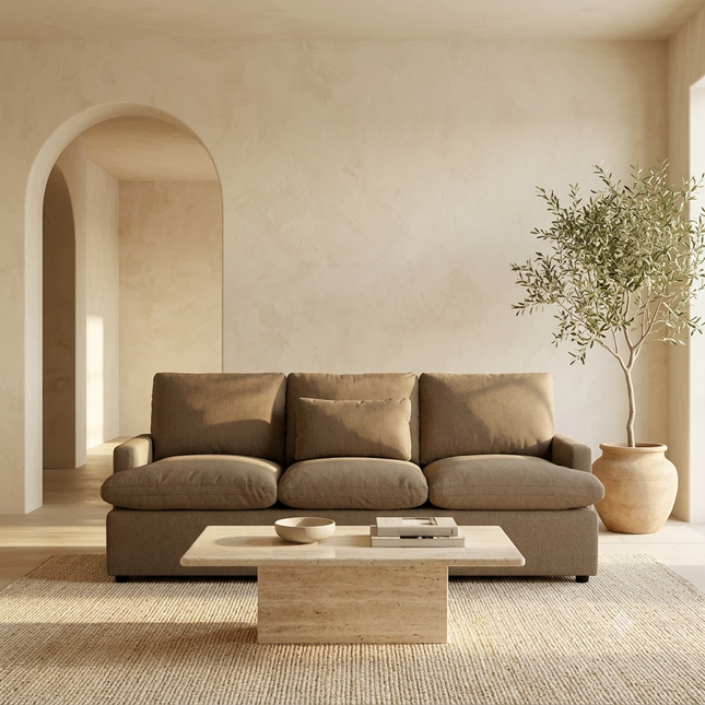 My Cloud Sofa in Earth staged in a warm minimalist living room with olive tree