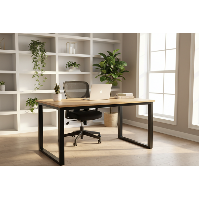 Acacia Loft Desk staged in a bright modern home office with a chair, laptop and plant-filled shelving