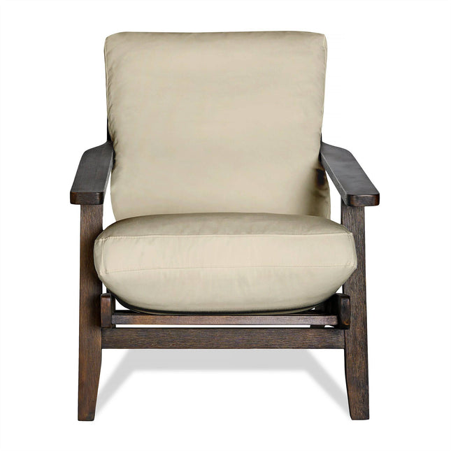 The Peyton Chair is a stylish, modern beige armchair with a dark wooden frame and mid-century design. It has thick armrests, a straight backrest, and plush cushions, ensuring comfort while maintaining minimalist elegance.