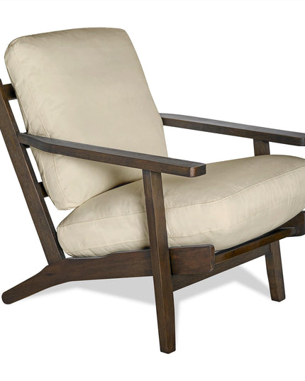 The Peyton Chair is a mid-century style wooden armchair with a dark brown frame and light beige cushions. It features angled legs and simple armrests, offering a modern, minimalist design ideal for any space.
