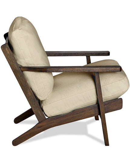 Side view of the Peyton Chair, a stylish mid-century modern piece. It features a wooden frame with angled legs and armrests, dark wood finish, and light beige cushions for contrast. The minimalist design enhances its comfort and elegance.