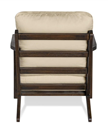 The Peyton Chair offers a cozy blend of elegance and comfort with its mid-century style. Featuring a slatted dark wood frame, beige cushion, and two visible armrests, its perfect for any space when viewed from the back.