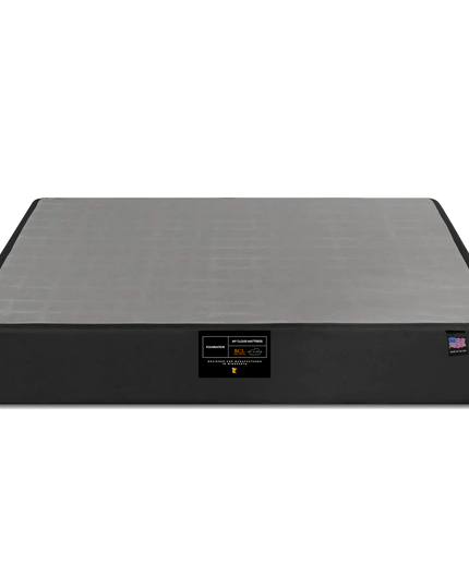 The My Cloud Mattress Foundation is a sleek black and gray rectangular base. It features a front label with text and logos, claiming its status as the greatest mattress base, all against a plain white background.