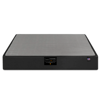 The My Cloud Mattress Foundation is a sleek black and gray rectangular base. It features a front label with text and logos, claiming its status as the greatest mattress base, all against a plain white background.